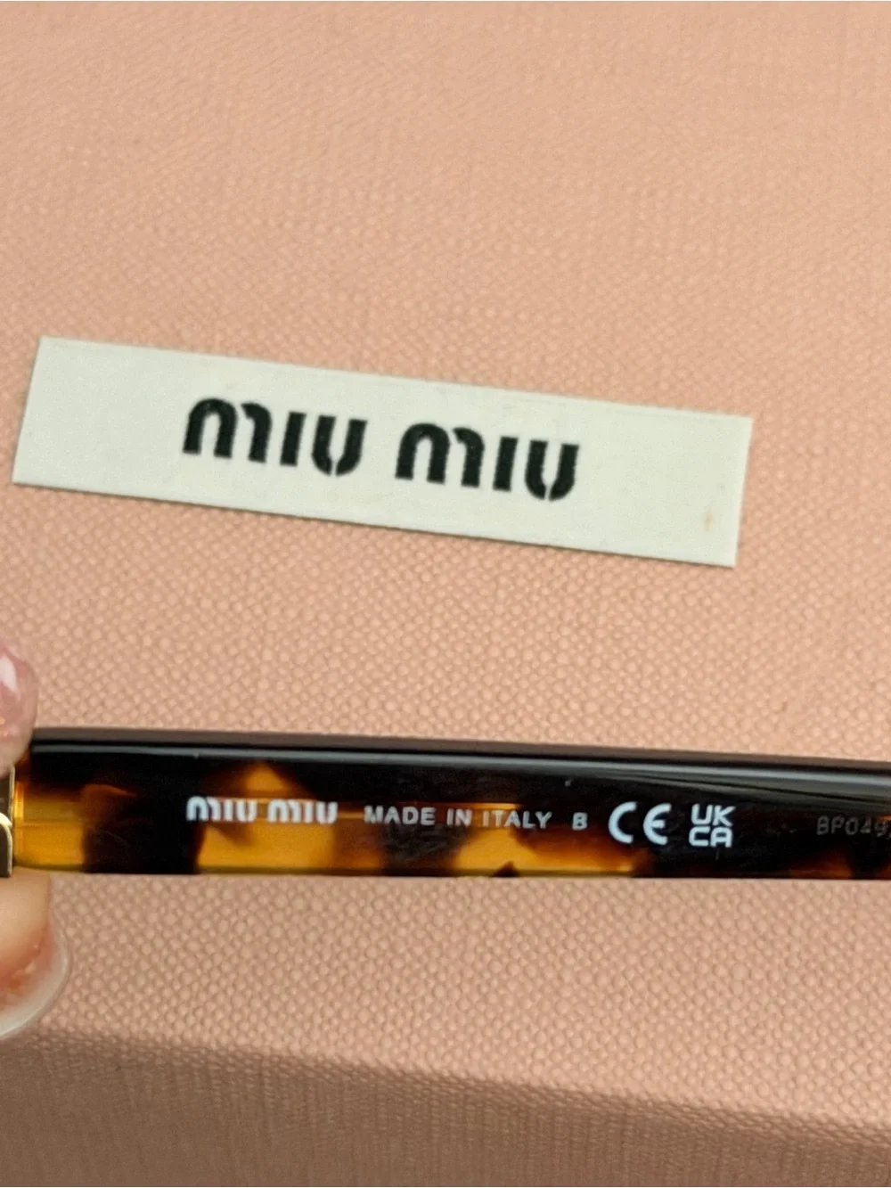 Miu Miu Tortoiseshell Frame Glasses with Gold Accents